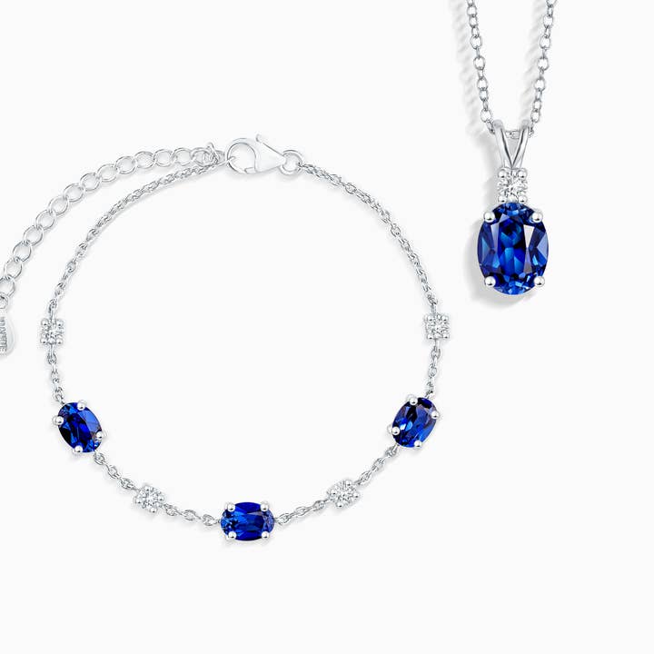 Juego de collar y pulsera de zafiro azul en plata de ley